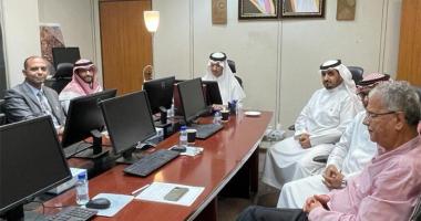 The Universal Access Program team meets with the engineer supervising the maintenance of the…